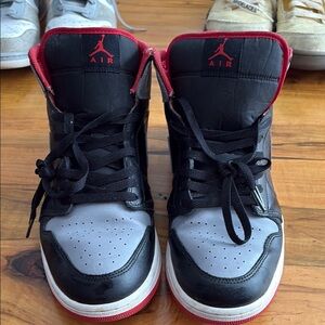 Air Jordan Black and Gray Sneakers with Red Accents.  Size 12